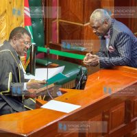 Speaker of the National Assembly Moses Wetang’ula shares a word with Rarieda MP Amollo Paul Otiende in the chambers