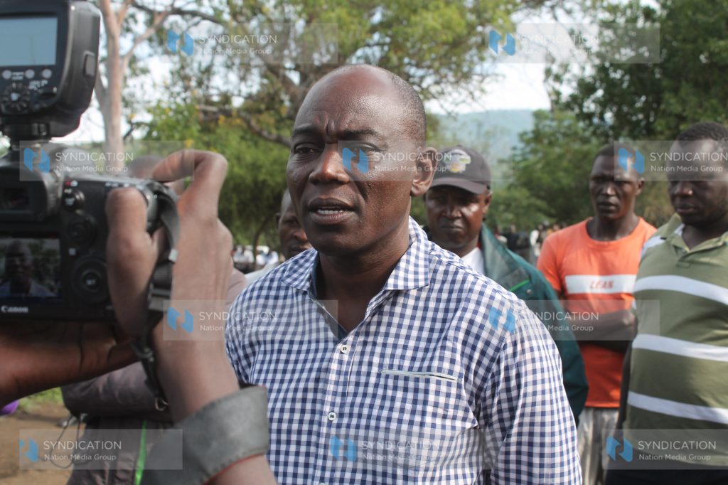 Caroli Omondi, an aspirant and former aide to opposition leader Raila Odinga, speaks to journalists