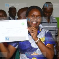 Jubilee Party Donya Dorice Aburi displays her nomination certificate