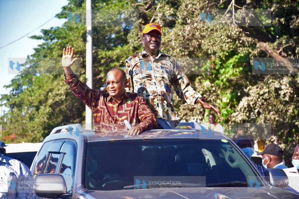 ODM leader Raila Odinga arrives at Ukunda for a rally accompanied by Kwale Senator Boy Issa Juma