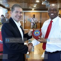 US ambassador in Kenya Kyle McCarter receives token of appreciation from Kenya Ports Authority [KPA] managing director Daniel Manduku