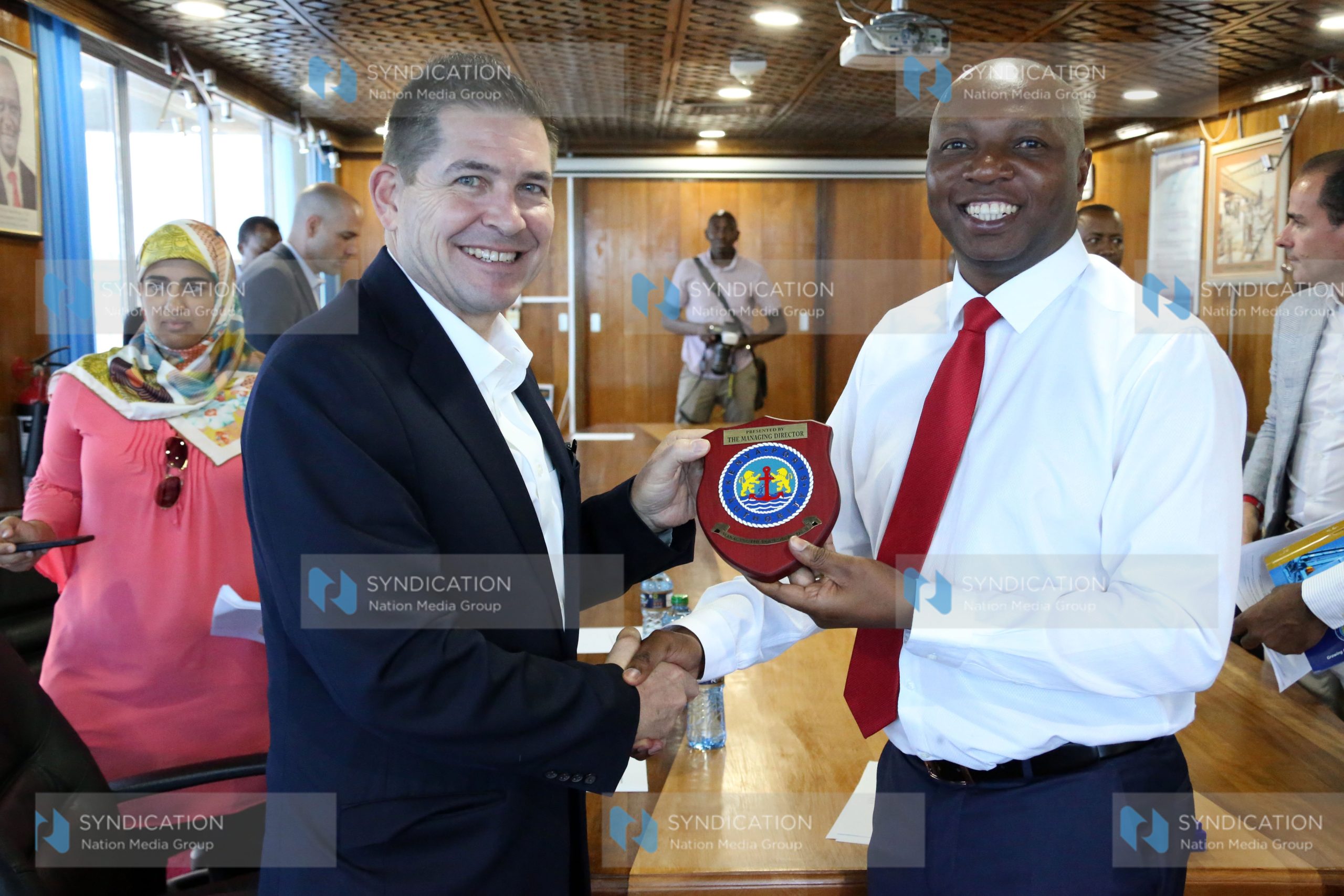 US ambassador in Kenya Kyle McCarter receives token of appreciation from Kenya Ports Authority [KPA] managing director Daniel Manduku