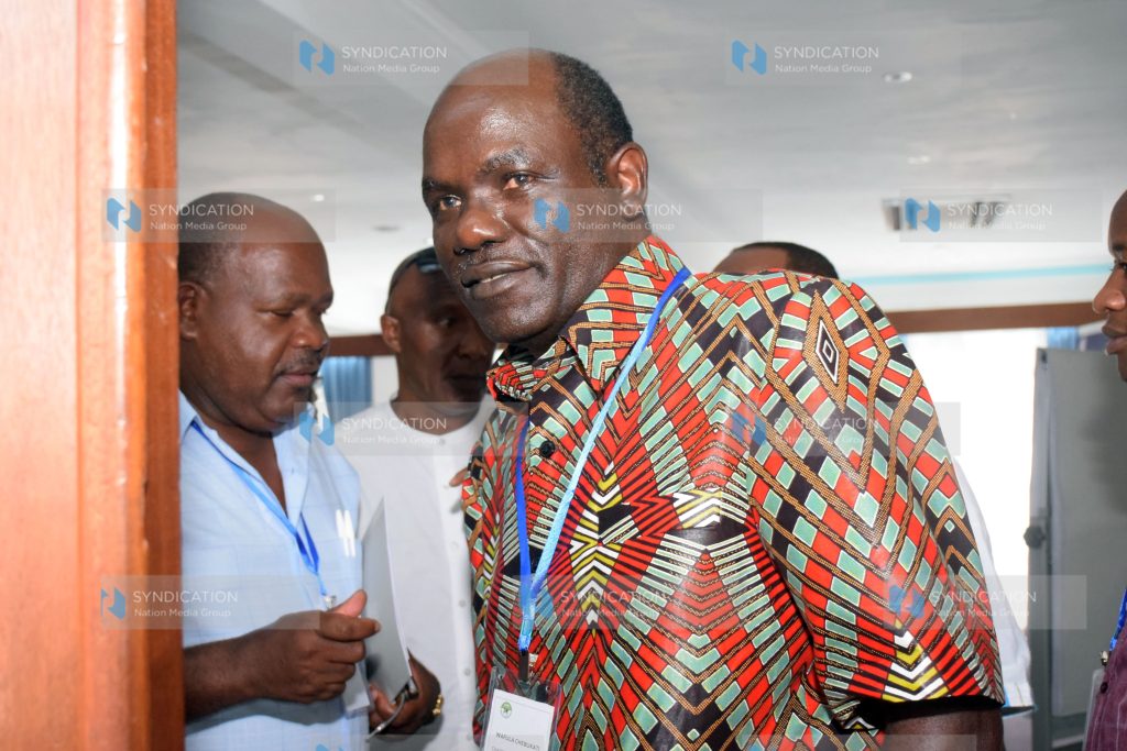 Independent Electoral and Boundaries Commission Chairman Wafula Chebukati leaves the conference hall