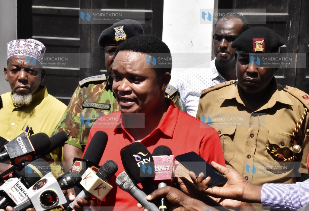 Kuria Kimani, addresses the press
