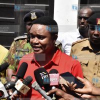 Kuria Kimani, addresses the press