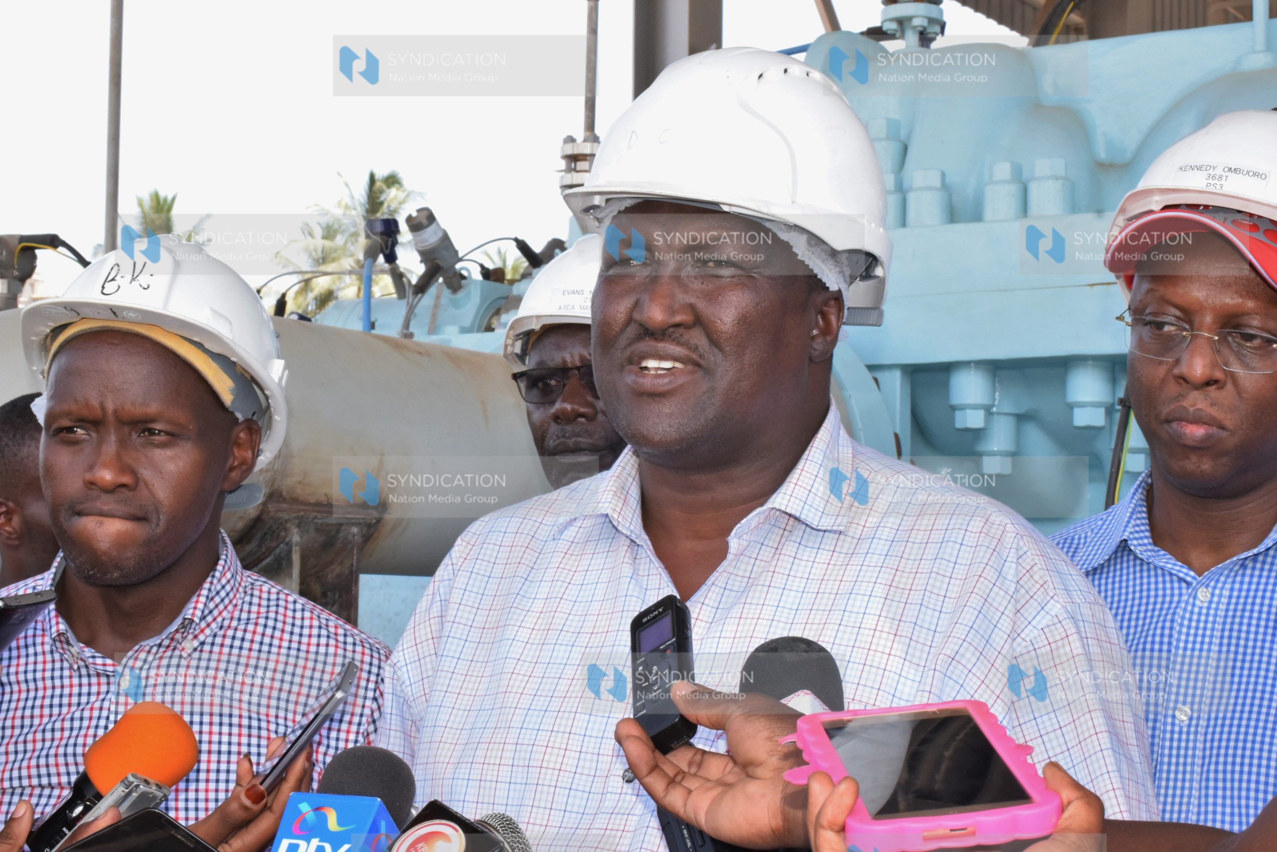 Petroleum and Mining Cabinet Secretary John Munyes, Petroleum PS Andrew Kamau (right) and Kenya Pipeline MD Joe Sang (left) address the press