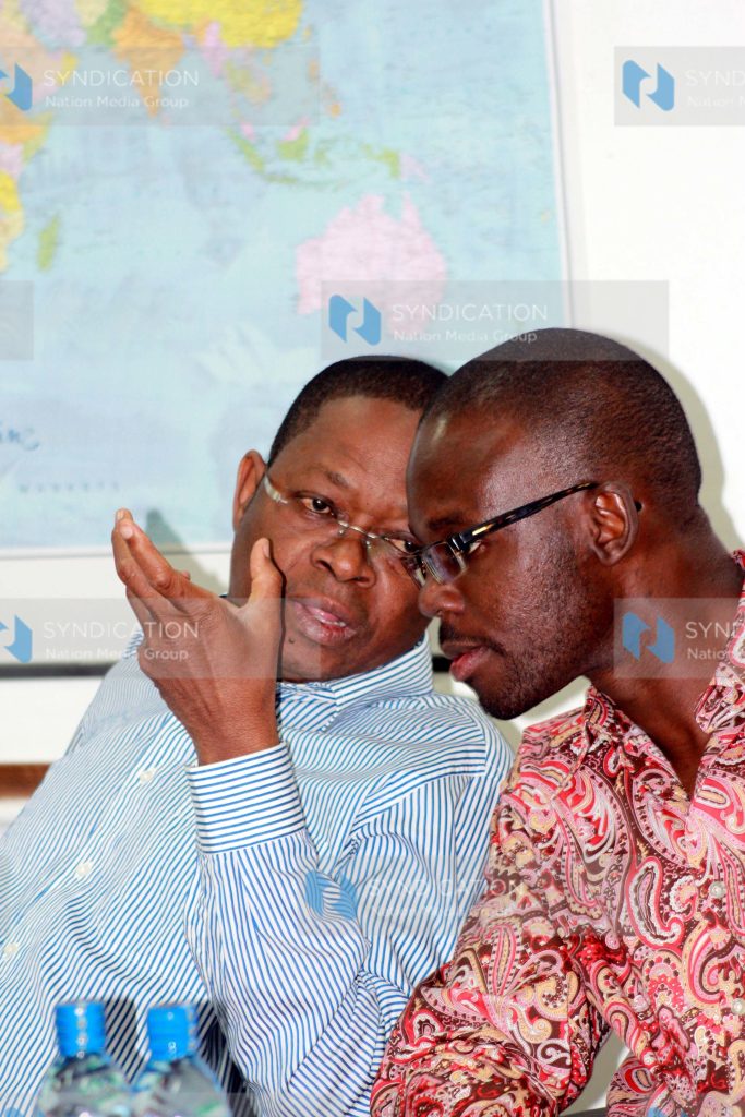 Senators Stewart Madzayo together with his counterpart from Homa Bay, Moses Kajwang', while at a session of the Senate Committee