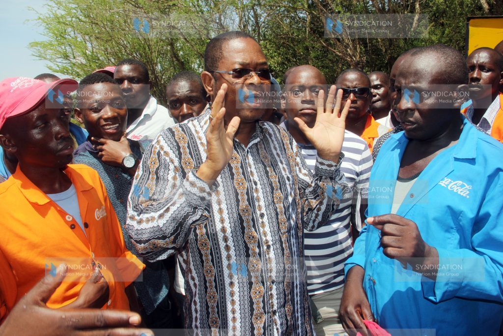 Kilifi senator Mr. Stewart Madzayo pleads with Coastal bottlers workers in Mtwapa