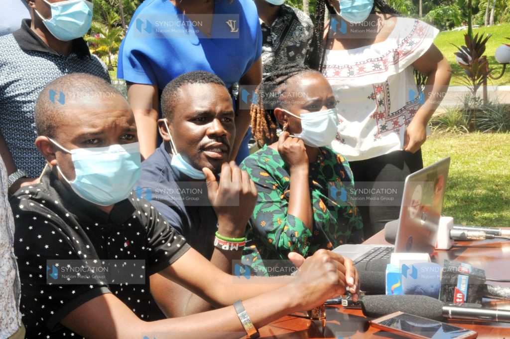South Mugirango MP Silvanus Osoro (centre), accompanied by his Molo counterpart Kuria Kimani and Ms. Mbuki Mburu, addresses a press