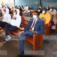 Tharaka Nithi Governor Onesmus Muthomi Njuki (right), Fridah Muthoni Murungi (centre) and Floridah Kiende at Milimani Anti-Corruption Court