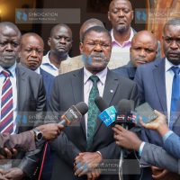 Addressing the media at the Lee Funeral Home Services