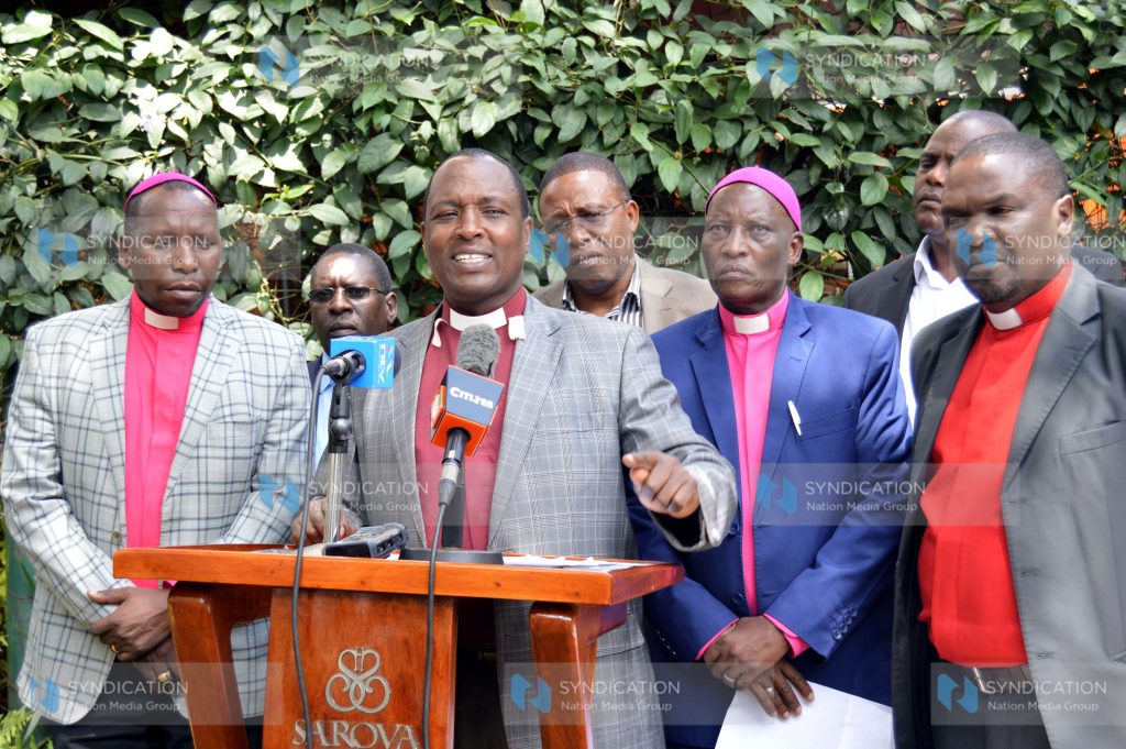 African Independent Church of Africa (AIPCA) Chancellor Moses Kirima (2nd left), accompanied by the church National Archbishop Julius Njoroge (2nd right)