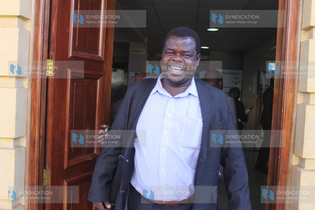 Activist Okiya Omtatah leaving Milimani Law Courts