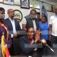 (Center) Nairobi Speaker Beatrice Elachi speaking to the press surrounded by her supporters