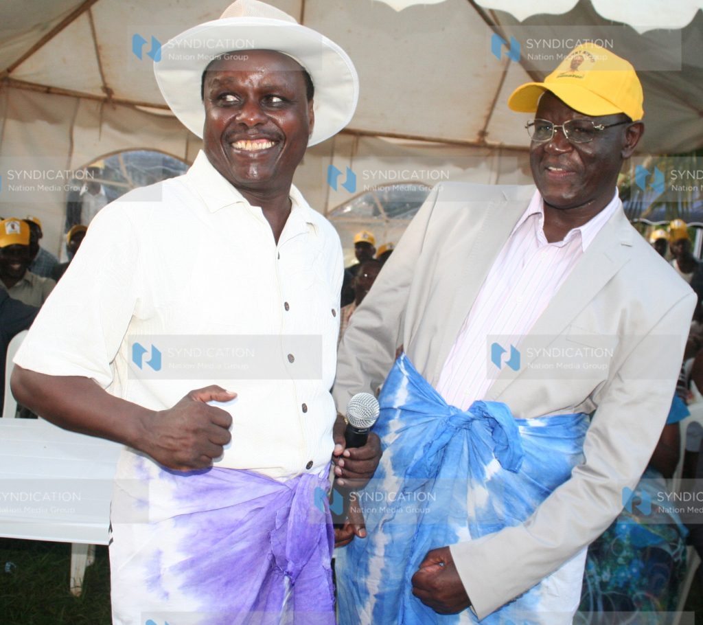 APK leader Kiraitu Murungi dances with his deputy, Lenny Kivuti, during a luncheon