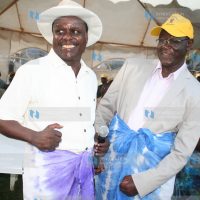 APK leader Kiraitu Murungi dances with his deputy, Lenny Kivuti, during a luncheon