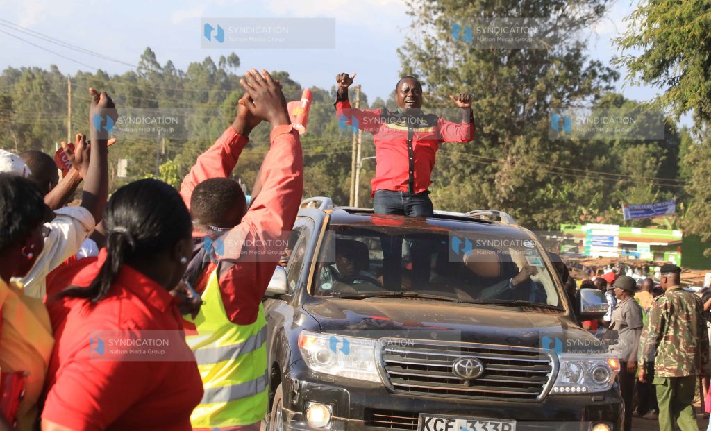 Embu Senator Lenny Kivuti acknowledges greetings from a crowd in Embu Town