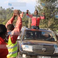 Embu Senator Lenny Kivuti acknowledges greetings from a crowd in Embu Town