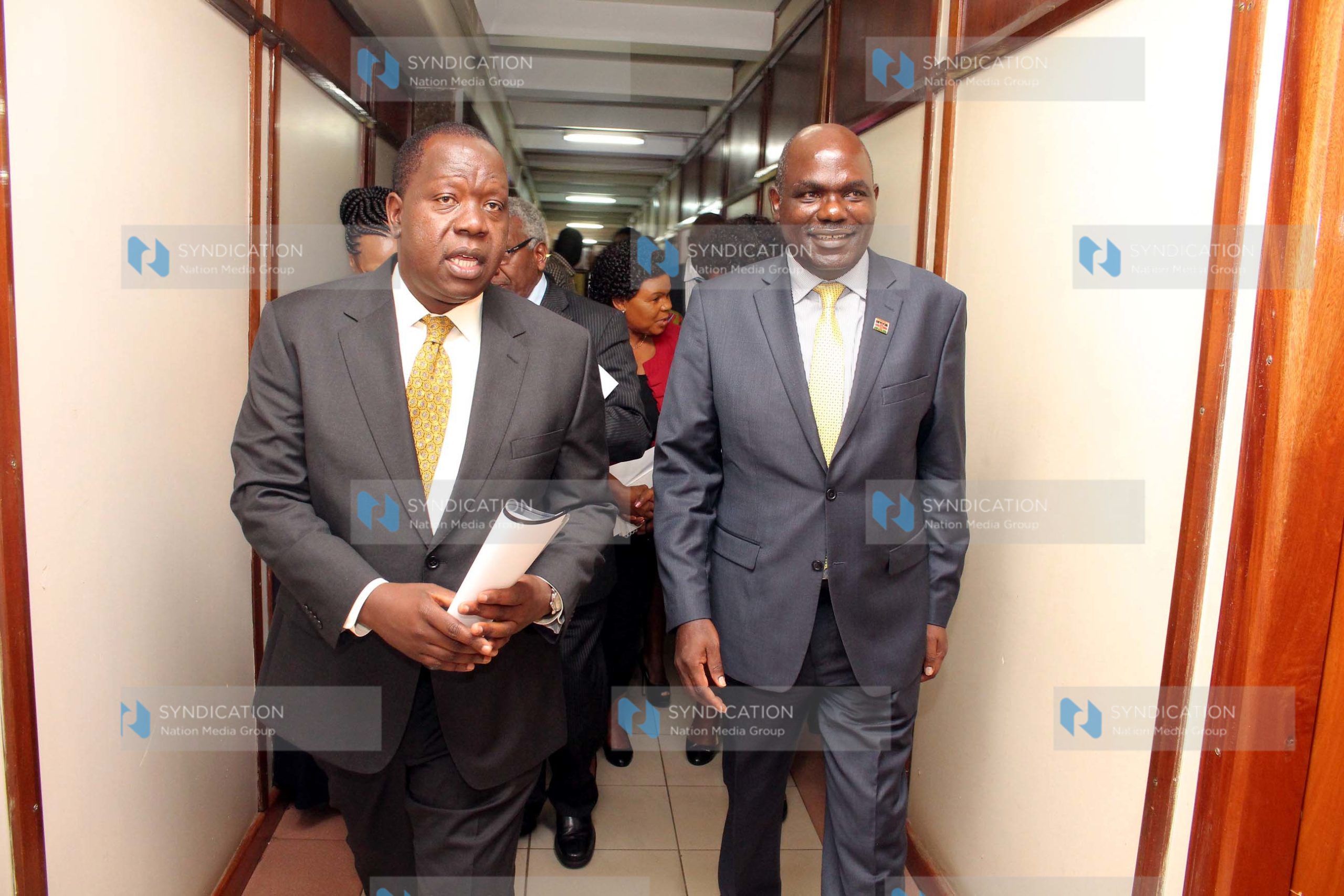 (IEBC) Chairman Wafula Chebukati (right) after the press conference at Jogoo house