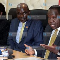 (IEBC) Chairman Wafula Chebukati (centre)