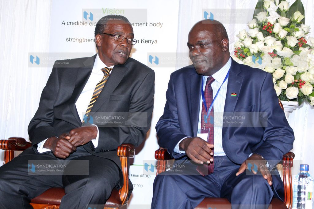 Electoral and Boundaries Commission Chairman Wafula Chebukati (right) with Chief Justice David Maraga