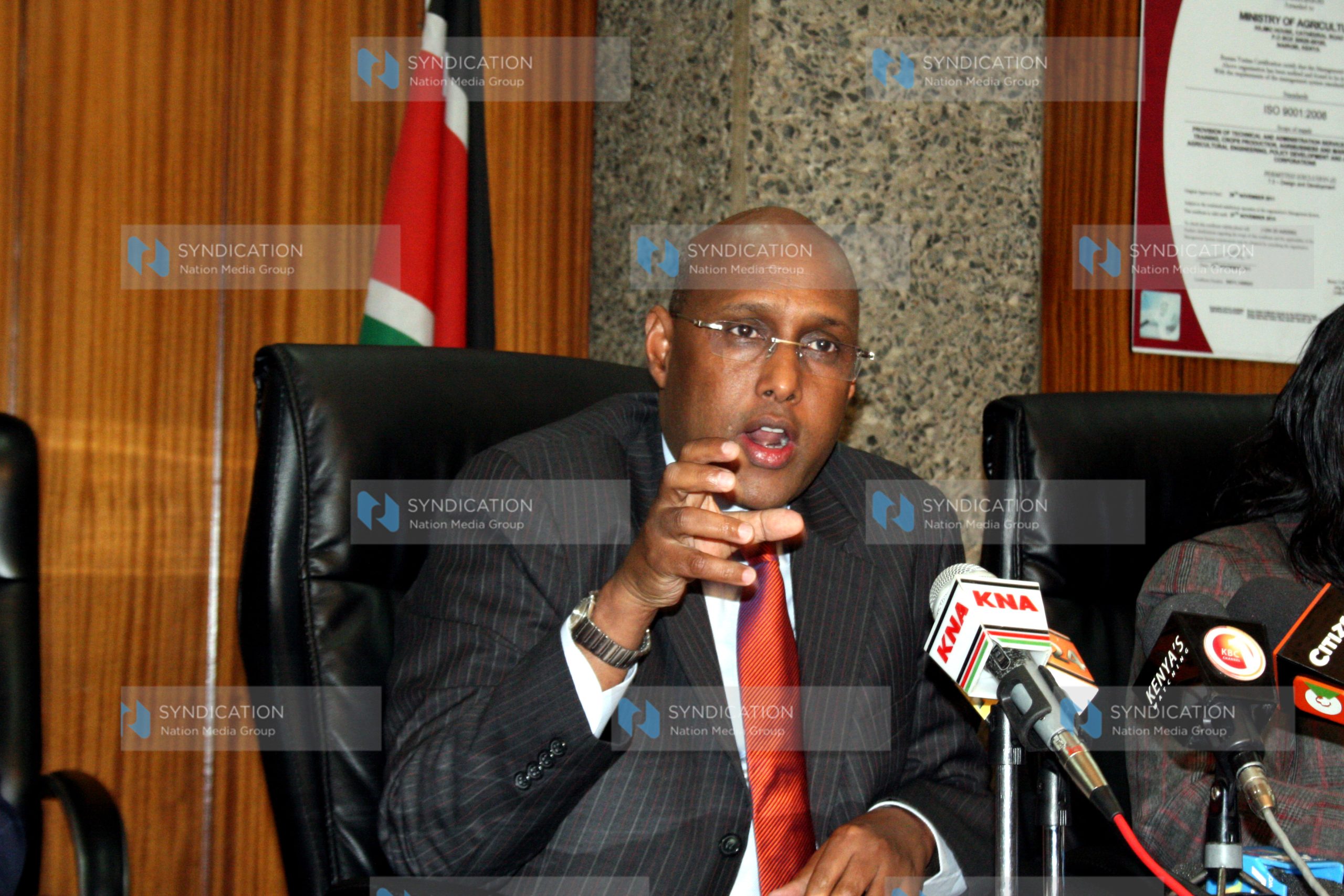 Acting Cabinet Secretary for Agriculture Adan Mohamed addressing press
