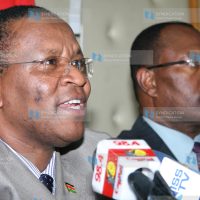 Principal secretary Karanja Kibicho (left) flanked by Political and diplomatic secretary Amb. Robert Ngesu addresses a media
