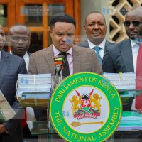 Addressing the media at Parliament Buildings