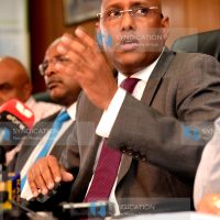 Acting Agriculture Cabinet Secretary Adan Mohamed (right) speaks during a media briefing
