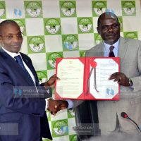 Executive Office of the President, Principal Administrative Secretary Kennedy Kihara presents a petition to IEBC Chairman Wafula Chebukati