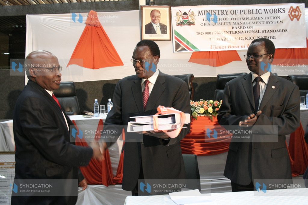 Public works minister Chris Obure during the launch of the ministry's ISO 9001-2008 certification