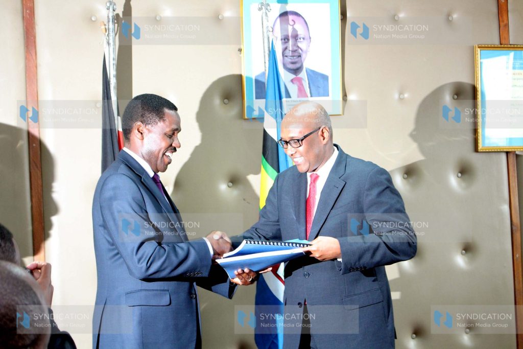 Trade and Industrialization Cabinet Secretary Peter Munya with the new CS Adan Mohammed