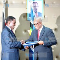Trade and Industrialization Cabinet Secretary Peter Munya with the new CS Adan Mohammed