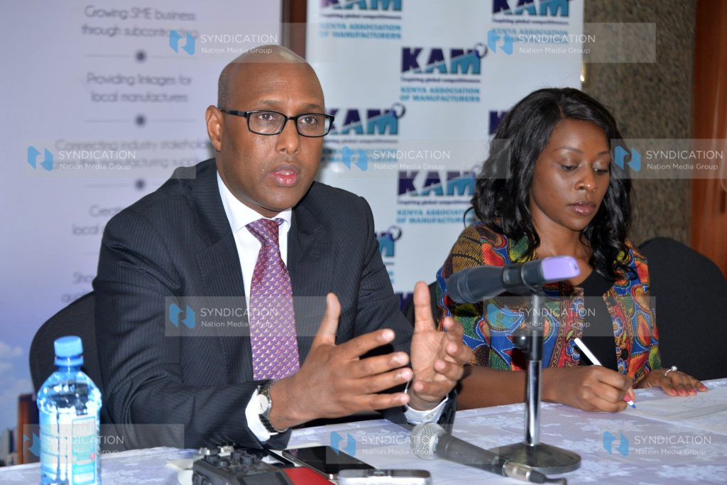 Cabinet Secretary Ministry of Industry, Trade and Cooperatives Adan Mohamed and Kenya Association of Manufactures (KAM) CEO Phyllis Wakiaga