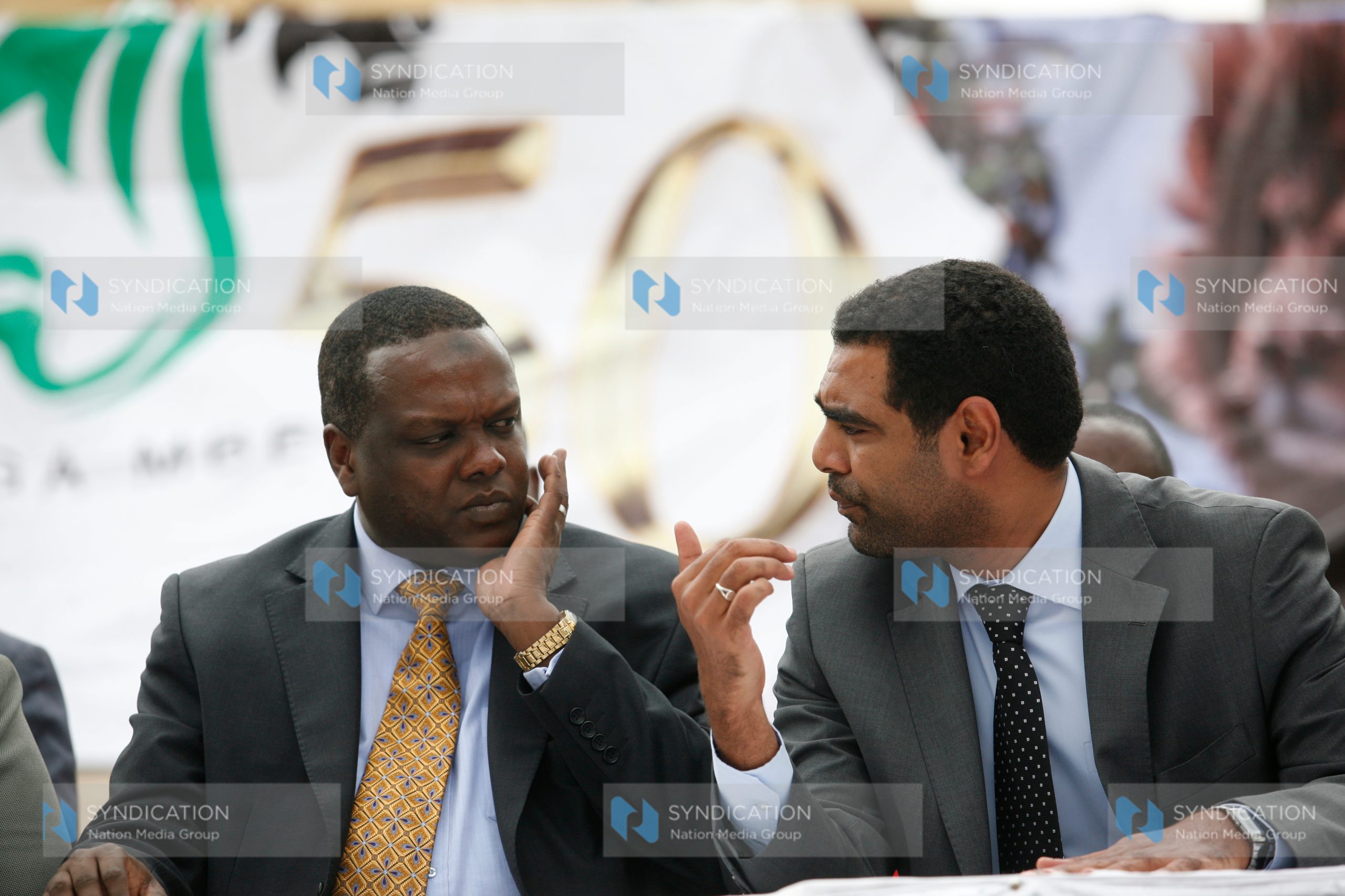 Cabinet Secretary for Sports, Arts & Culture Dr. Hassan Wario and Kenya at 50 Public Relations and Communications Director Hussein Mohammed