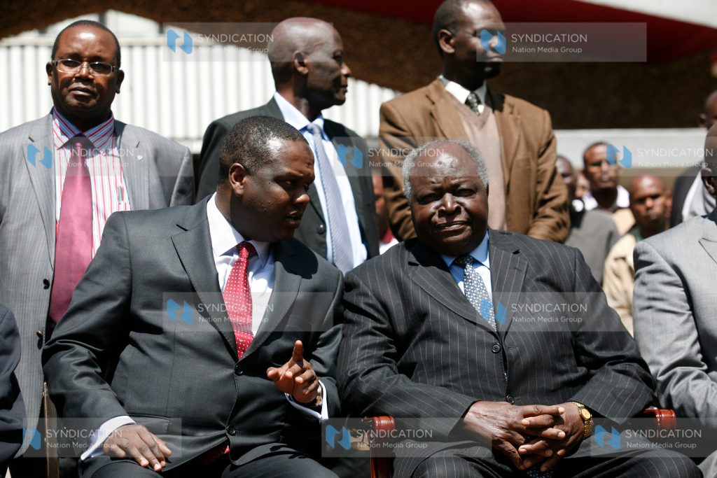 Former President Mwai Kibaki with Cabinet Secretary for Sports, Culture and Arts Hassan Wario