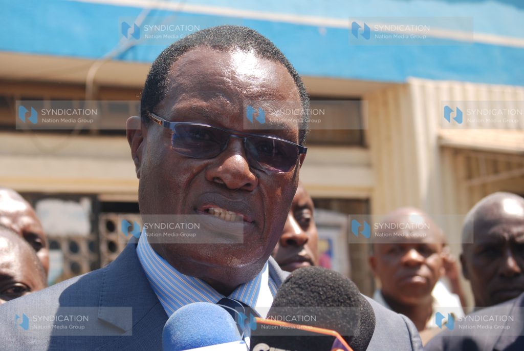 Chris Obure addresses the press at Kenyatta National Hospital