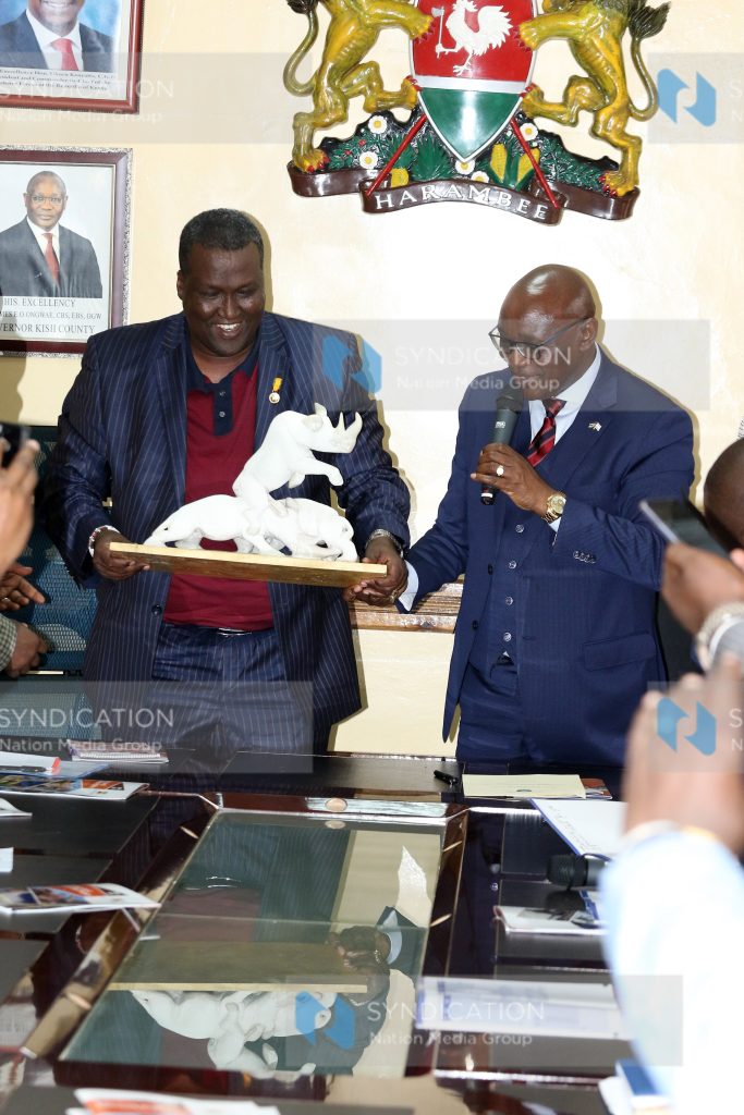 Kisii County governor James Ongwae with Cabinet Secretary Mining and Petroleum John Munyes