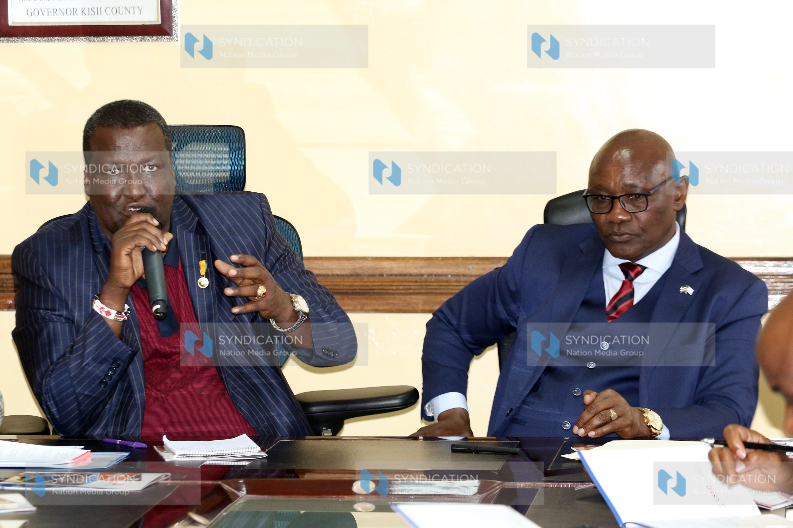 Kisii County governor James Ongwae with the Cabinet Secretary Mining and Petroleum John Munyes