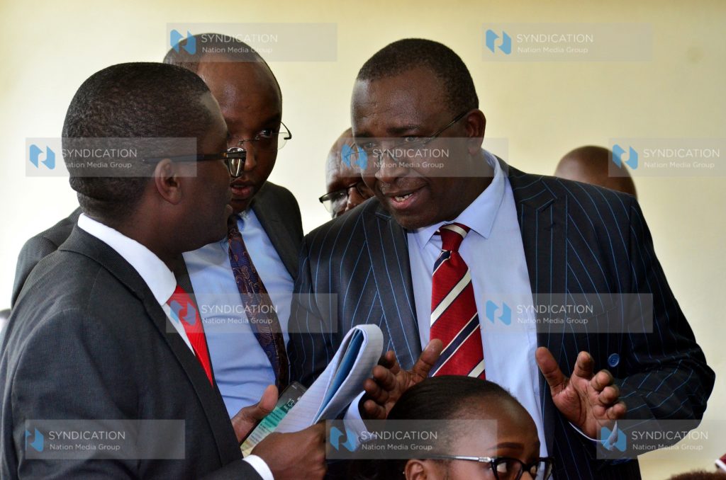 Meru Senator Mithika Linturi confers with his lawyers