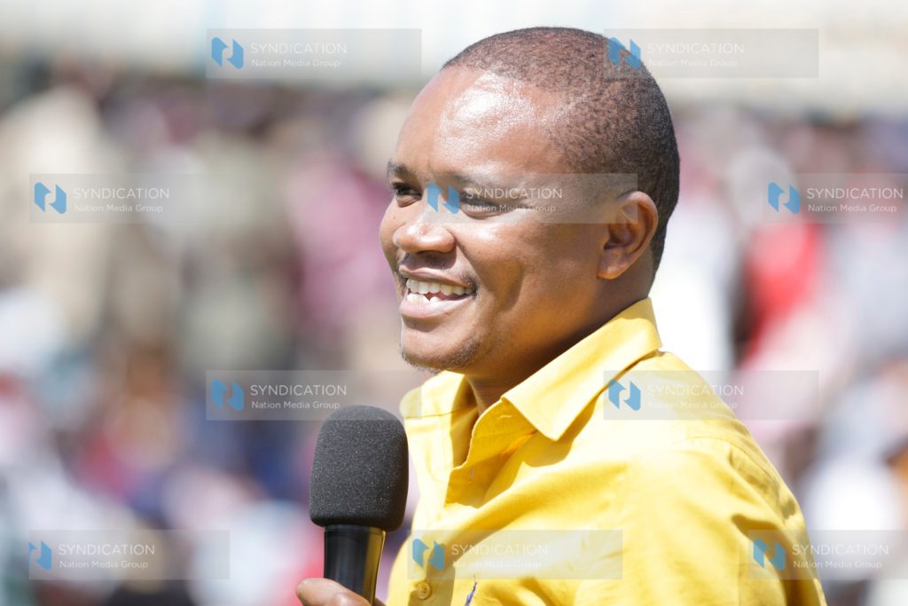 Molo MP Kuria Kimani addresses members of the public during the application of bursary forms