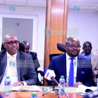 Cabinet Secretary of the East African Community and Regional Development Adan Mohamed flanked by Lake Basin Authority MD Raymond Omollo