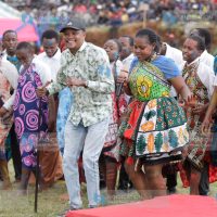 Molo MP Kuria Kimani engages in a jig with students