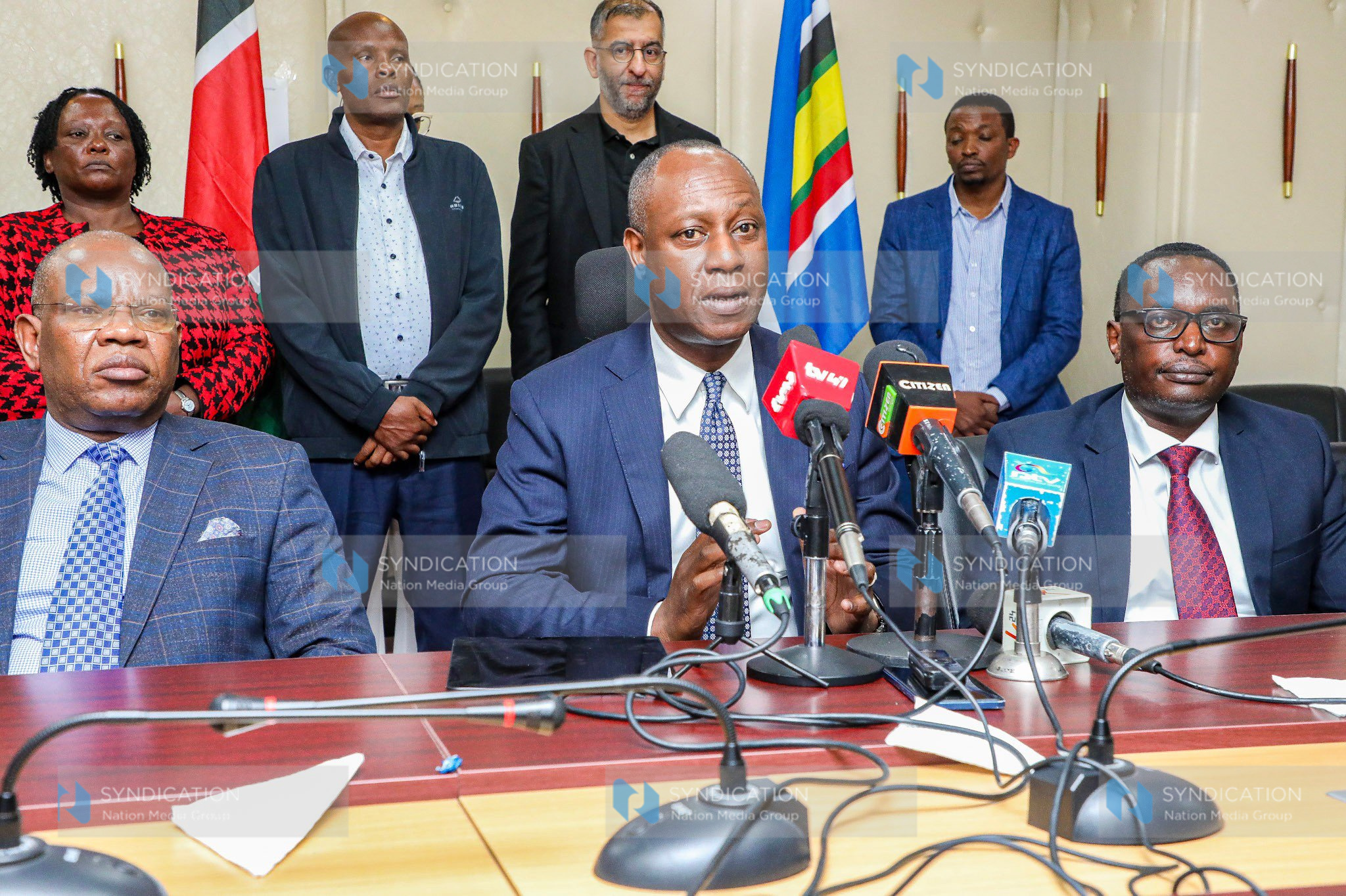 State Department for Livestock Development Principal Secretary Jonathan Mueke (center) with Kenya Dairy Board Chairman Genesio Mugo and KDPA Chairman Kenneth Gitonga