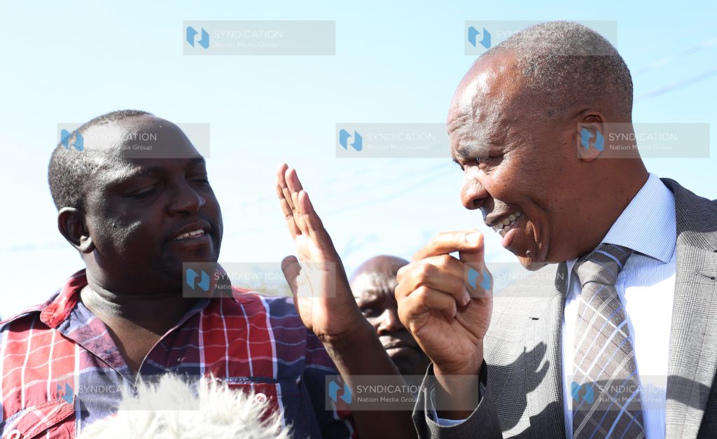Mavoko MP Patrick Makau with Cabinet Secretary Michael Kamau