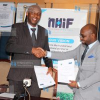 National Hospital Insurance Fund (NHIF) CEO Dr. Peter Kamunyo with Murang'a County Governor Irungu Kang'ata