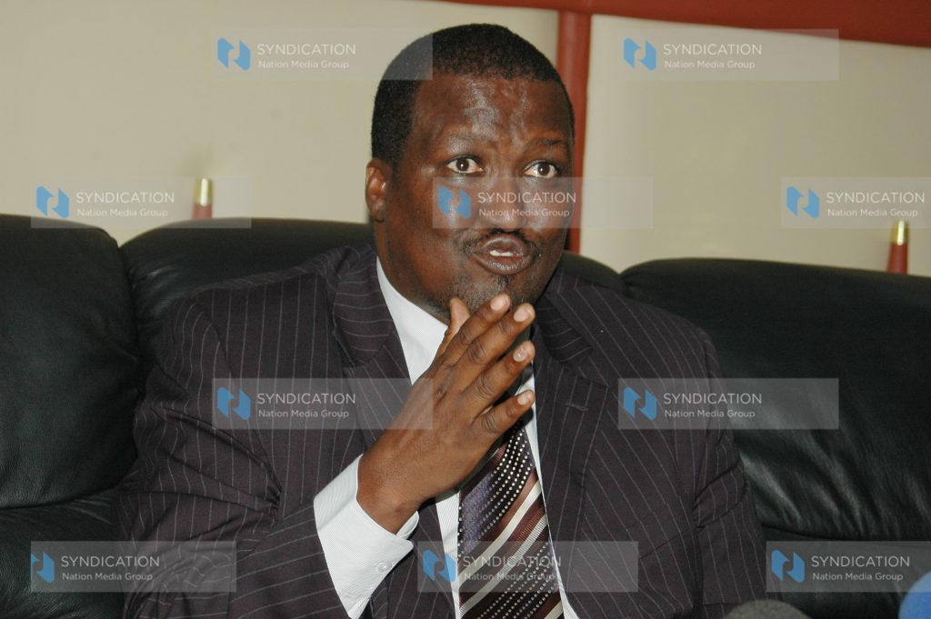 Labour minister addressing a press conference where he announced the new NSSF managing trustee Alex Kazongo