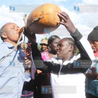 Kipsigis women serve Molo MP Kuria Kimani with mursik