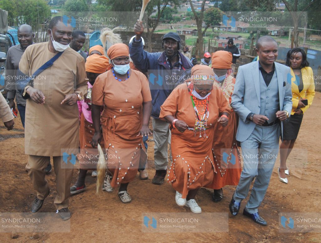 Speaker of the National Assembly Justin Muturi and Molo MP Kuria Kimani are welcomed by Agikuyu traditional dancers