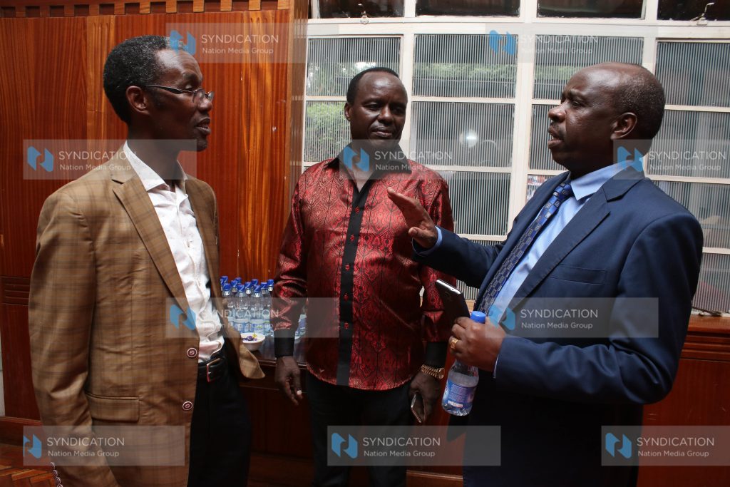 NACADA Chairman John Mututho chats with Embu Senator Lenny Kivuti and Kangema MP Tirus Ngahu